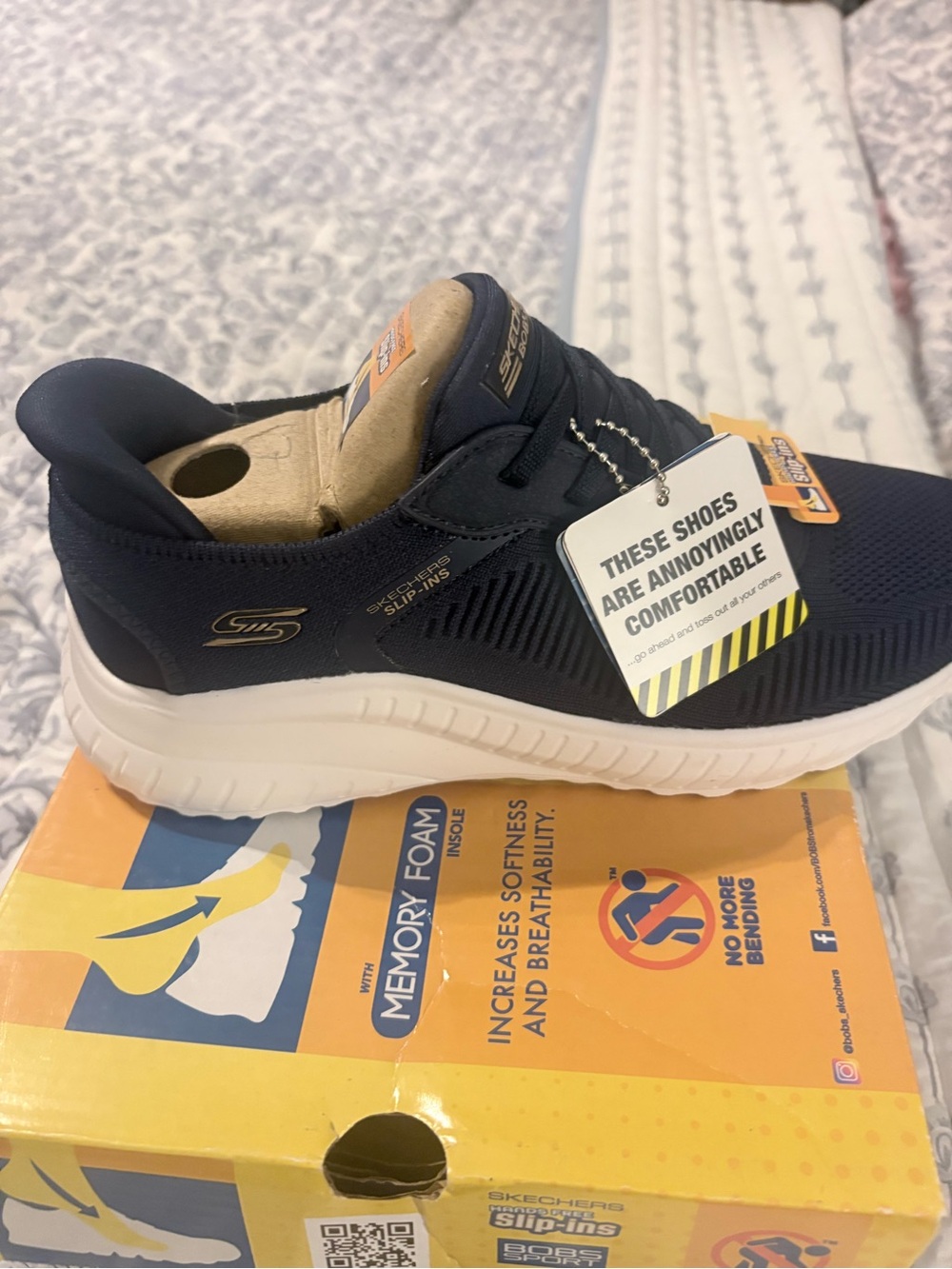 Skechers Womens  Navy and White Slip-On Athletic Sneakers